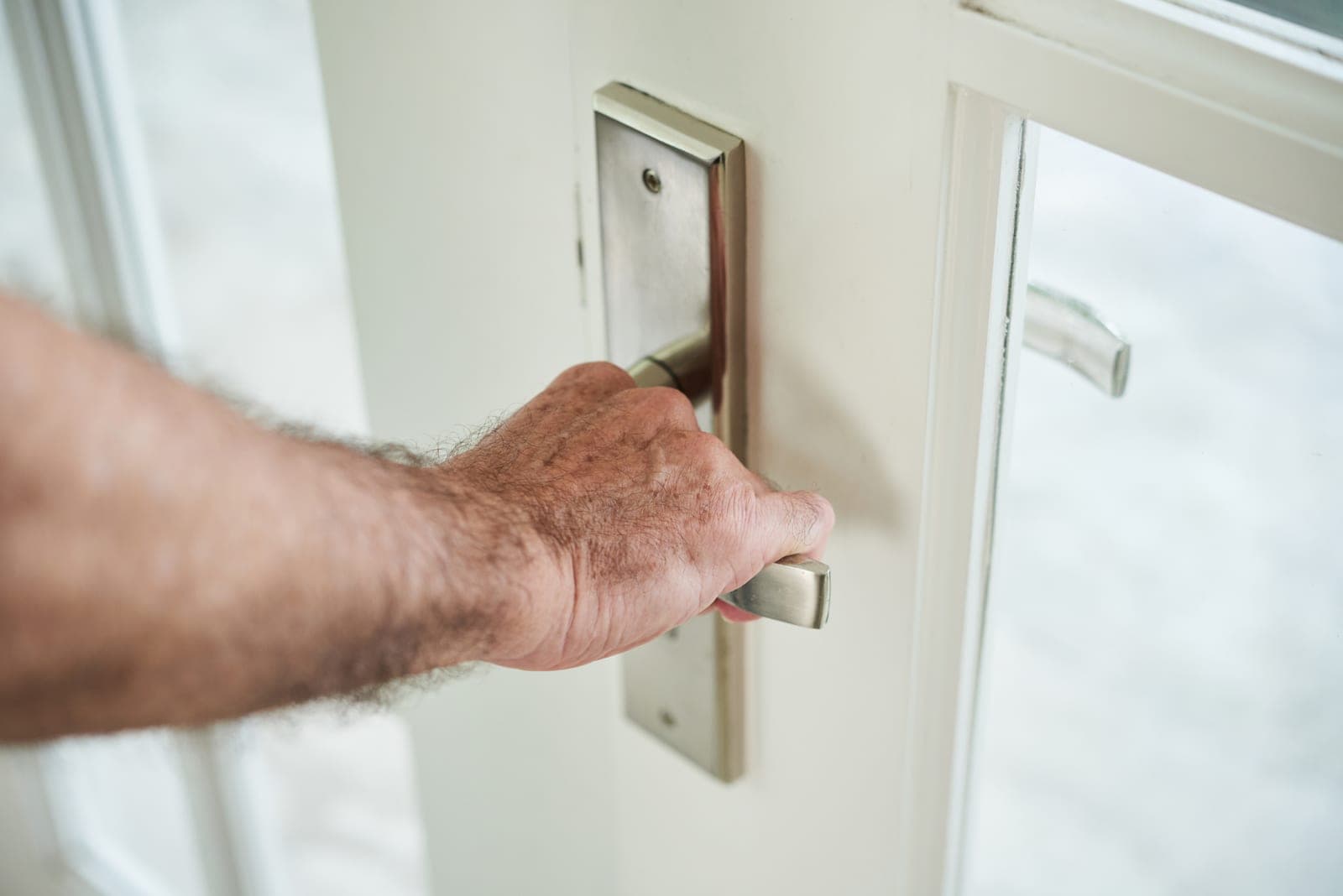Urban Locksmith engineer fitting a door lock